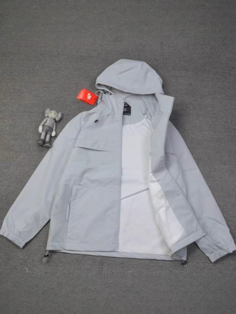 Nike hooded jacket, casual outdoor windbreaker jacket.