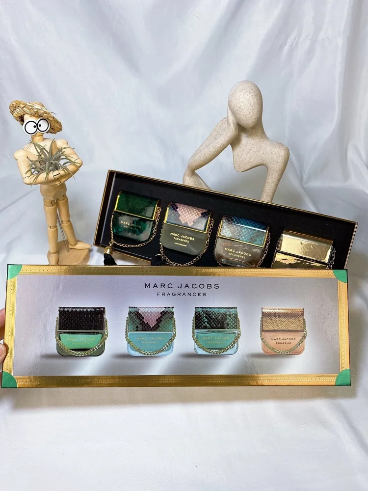 Mark Mojer sample perfume set (30ml x 4), with spray nozzle, includes: Blue Daisy Dream, Yellow Daisy, Elegant Handbag, and Pink Daisy.