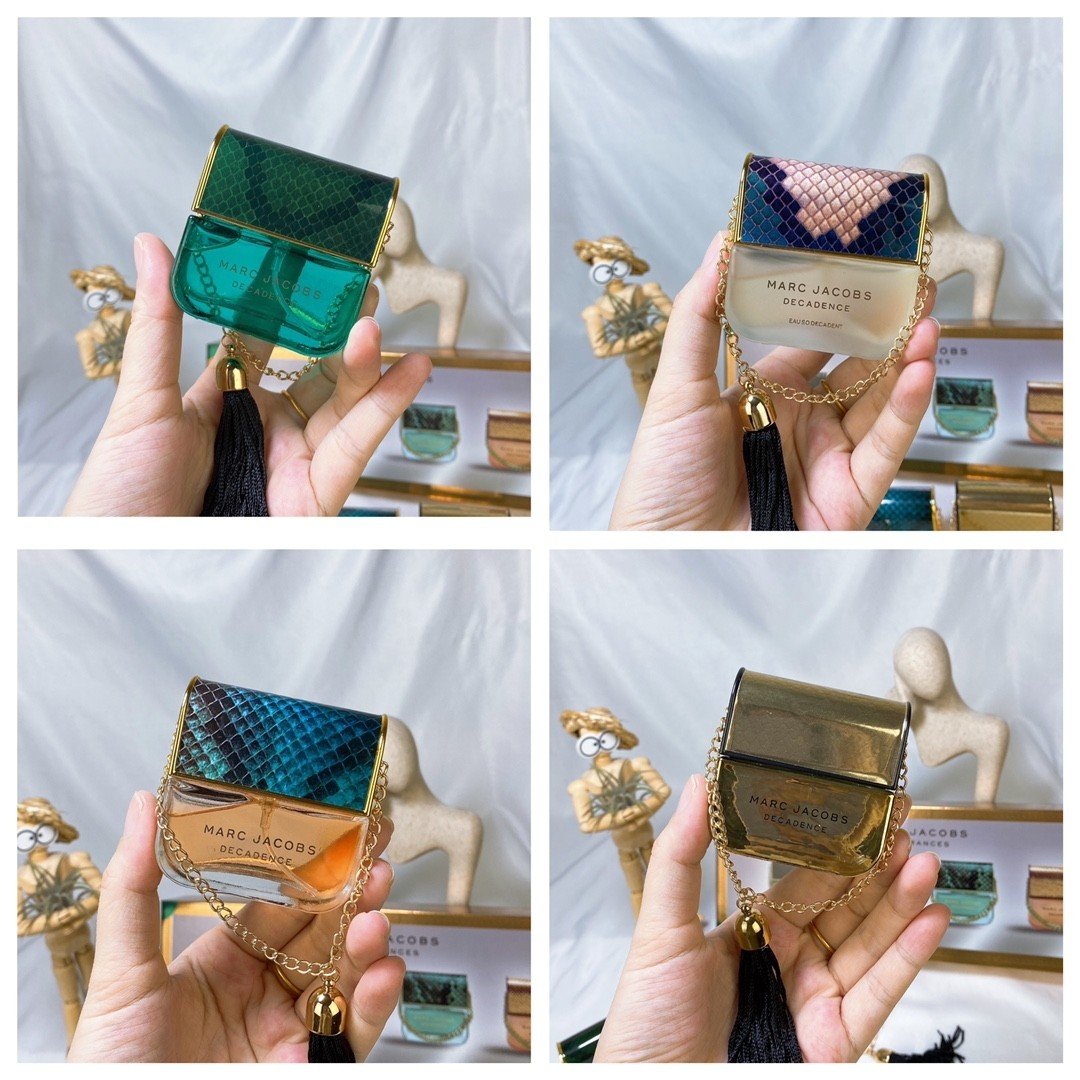 Mark Mojer sample perfume set (30ml x 4), with spray nozzle, includes: Blue Daisy Dream, Yellow Daisy, Elegant Handbag, and Pink Daisy.